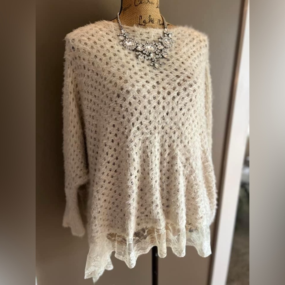 Cozy up in this soft cashmere-like sweater by Gracia. A vintage find!!